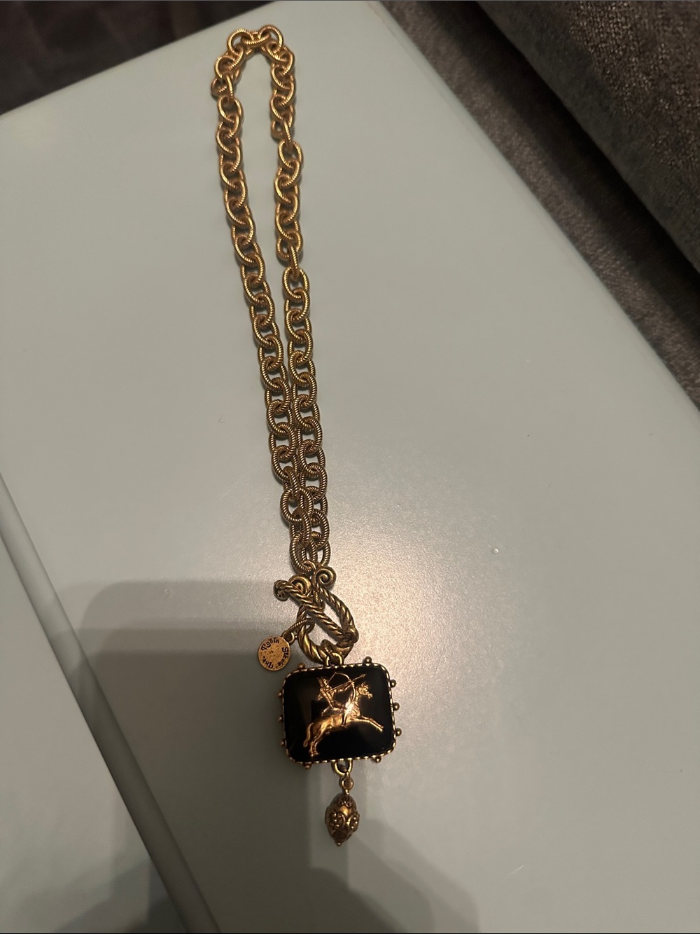 Gold-Tone Necklace with Black Enamel Equestrian Pendant